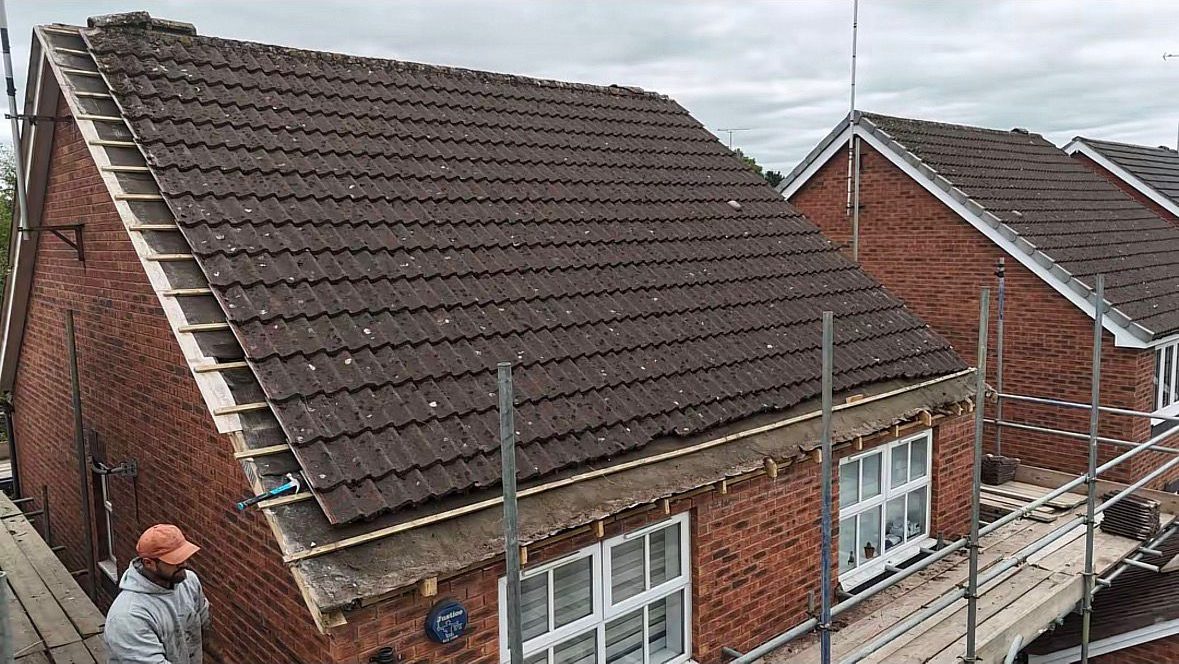 Roof verge stripped of old mortar and re-battened ready for a dry verge system